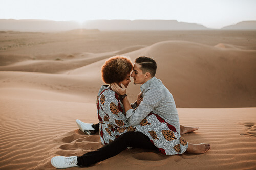 An engagement shoot at sunrise in the desert of Morocco. We love spiritual couples who celebrate their love in nature.